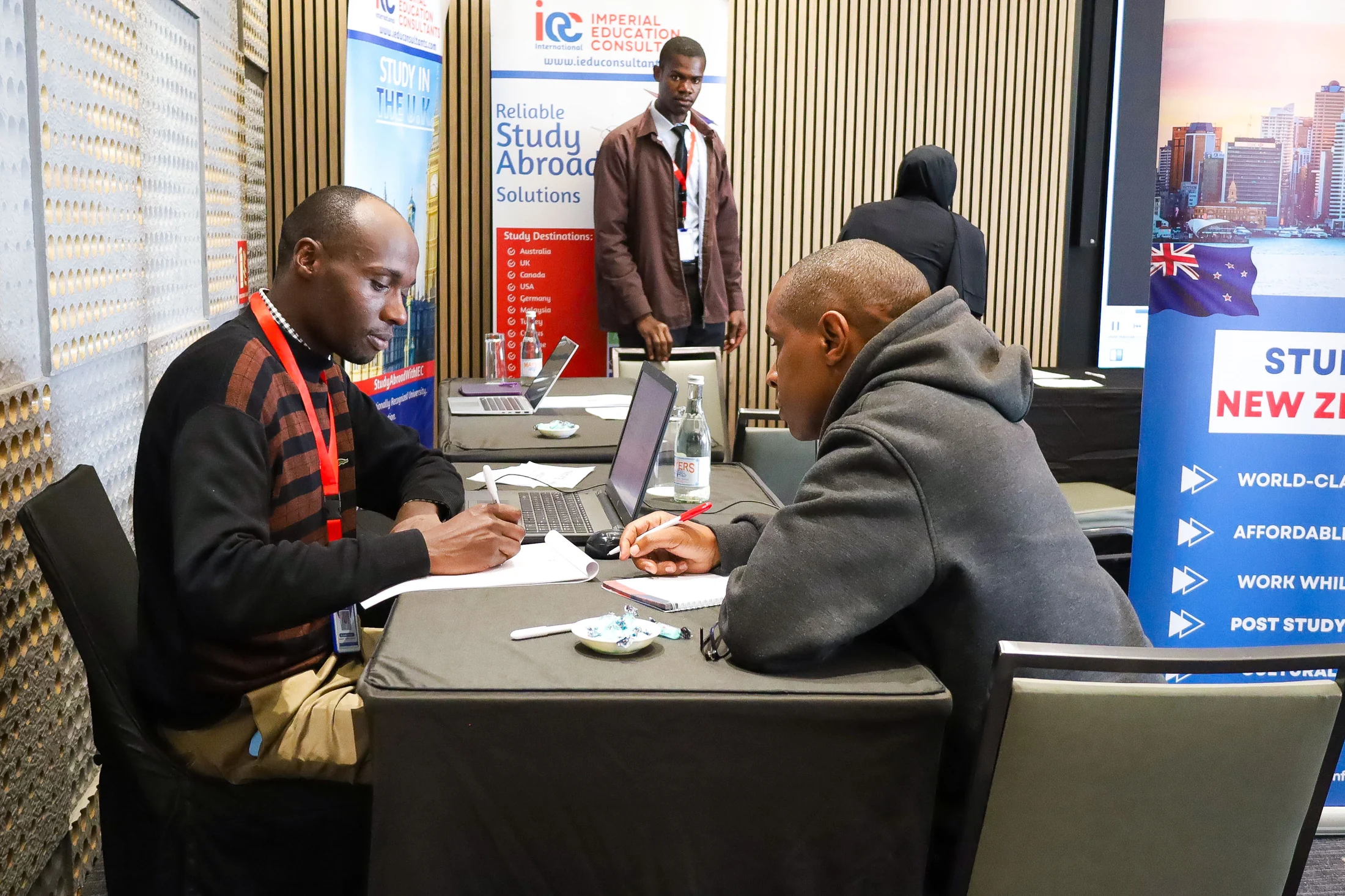 IEC counselor reviewing study options with a student